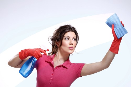 Trusted cleaner in Belsizepark performing detailed home cleaning